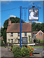 TQ5532 : Half Moon Inn sign and Bakers Corner by Oast House Archive