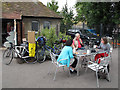 Cyclists outside a cafe