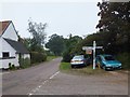 Aylesbeare Cross with an extra sign