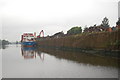 Loading scrap metal on the ship canal