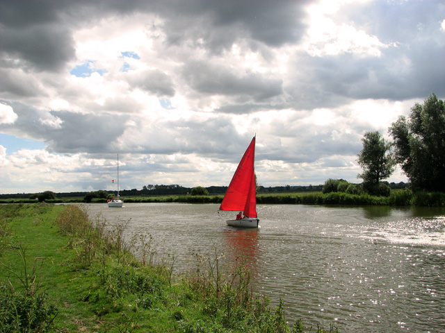 Red sails on the River Bure by St Benet's Abbey