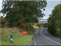 R8150 : Village sign west of Doon (DÃºn Bleisce) on the R505 by Neil Theasby