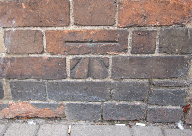 1GL bench mark and bolt on #3 Ely Street