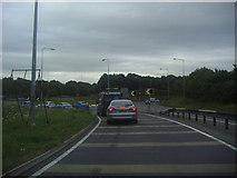 TQ4099 : Roundabout at the end of Dowding Way by David Howard