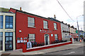 O2839 : Colourful buildings, Howth, Ireland by Christine Matthews