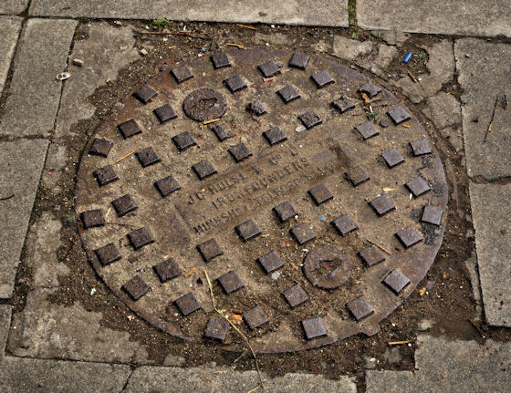 JC Hulse manhole cover, Larne (1) © Albert Bridge :: Geograph Ireland