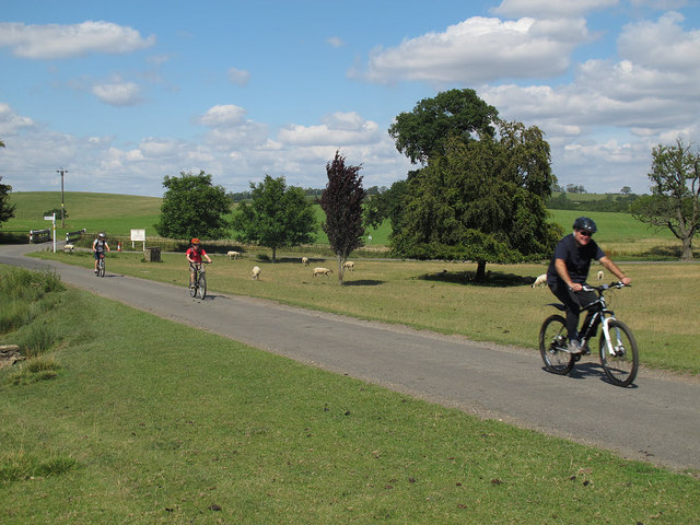 Cyclists passing Launde Abbey