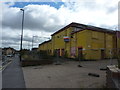 Yellow industrial premises to let