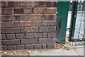 Benchmark on wall at entrance to Netley Primary School and Nursery, William Road