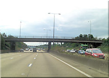 TQ0561 : M25 bridge carries A245 by Stuart Logan