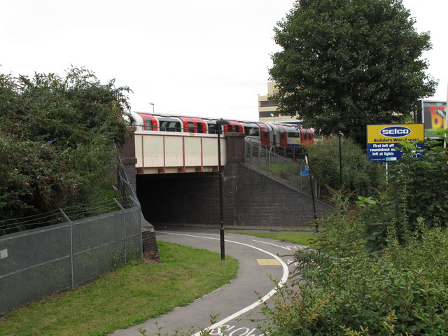 Central Line train over cycle track by Hanger Lane Gyratory