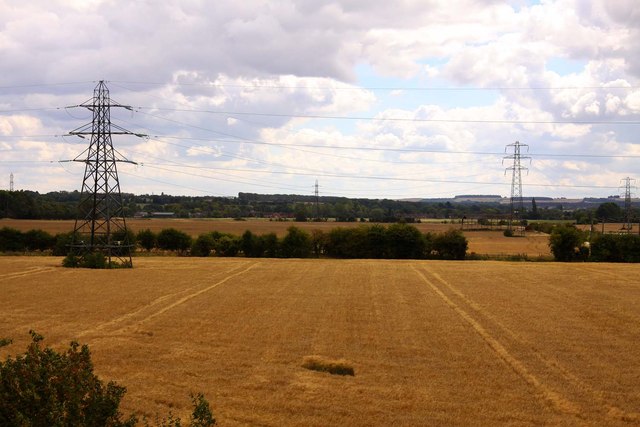 Harvested fields under the wires