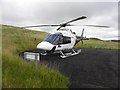 H2049 : Helicopter N119JT on the pad, Ross by Kenneth  Allen