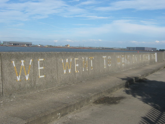 Poem on the riverside wall near River Thames