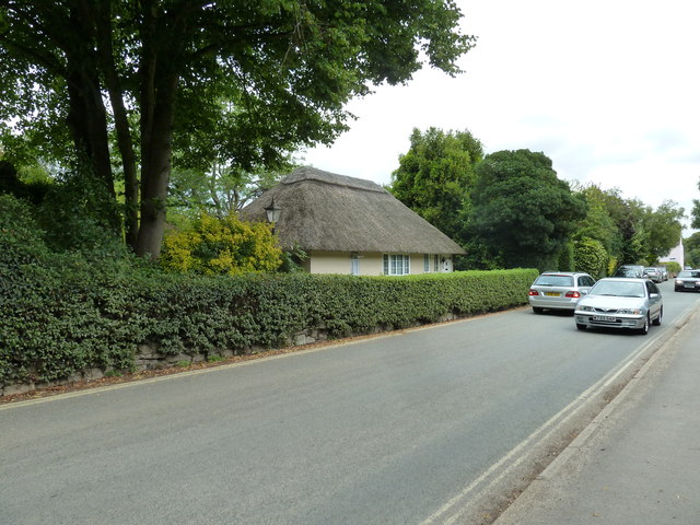 Cars passing in Bosham Lane