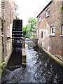 Restored waterwheel in Morden Hall Park