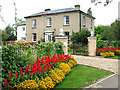 Colourful floral display on the road through Stradbroke