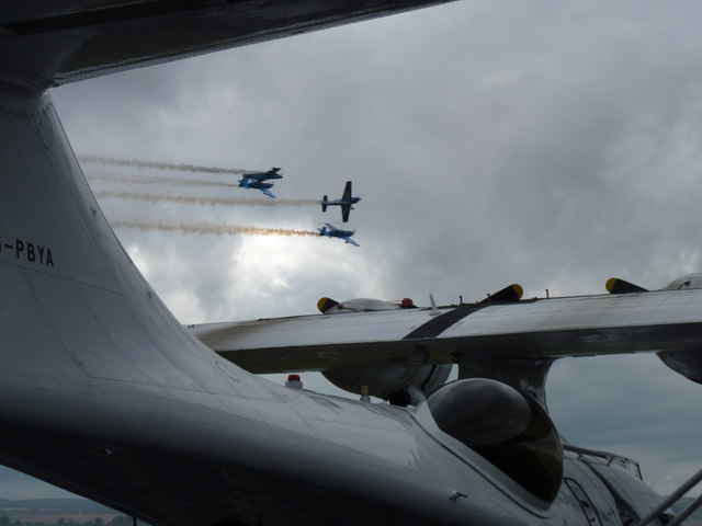 The Blades display team framed by a Catalina flying boat