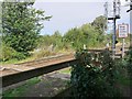 Footpath crosses railway south-west of Ovingham Bridge