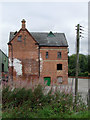SJ9922 : Old mill building near Great Haywood Junction, Staffordshire by Roger  D Kidd