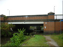 SJ8699 : Bridge #84, Hulme Hall Lane, Rochdale Canal by Ian S