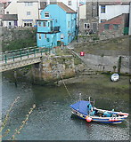 NZ7818 : Boat in Staithes Beck by Graham Horn