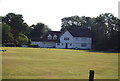 Large house by the cricket field, Ewhurst Green