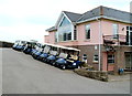 Row of dark blue golf buggies, Greenmeadow Golf & Country Club, Croesyceiliog