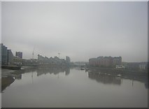 TQ2676 : Battersea Reach, from a train crossing the Battersea railway bridge on a foggy morning by Christopher Hilton