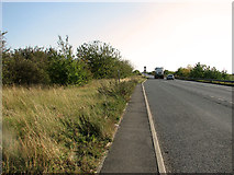 SE9503 : View south along the A15 road  by Hibaldstow by Evelyn Simak