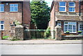 Gateposts to a small ginnel