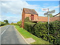 Finger post at the centre of Staverton