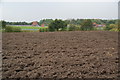 Ploughed field in front of Glazebury Sewage Treatment Works