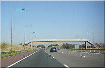 NY5714 : Footbridge over the M6 by Peter Bond