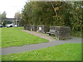 ST2995 : Two benches and three low stone walls opposite Forge Hammer roundabout, Cwmbran by Jaggery