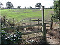 Finger post and stile on a footpath near Gains Park, Shrewsbury