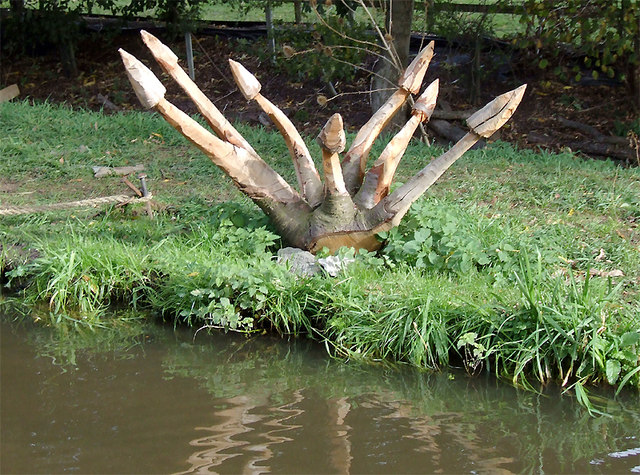 Wood sculpture by the Trent and Mersey Canal