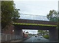 The railway bridge over Three Tuns Lane