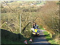 Telephone engineers erecting poles on Redbridge Road