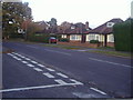 Junction of Aprilwood Close and Woodham Park Road