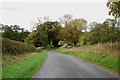 Wallbrook  Road as it drops down to the Wall Brook