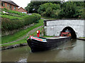 Narrowboat emerging from Barnton Tunnel, Cheshire