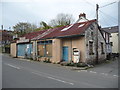 Disused garage building in Bridgend, Cardigan