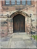 SJ6543 : Parish Church of St James the Great, Audlem, Doorway by Alexander P Kapp