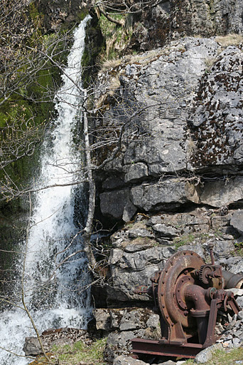 Waterfall and Rusty Pump