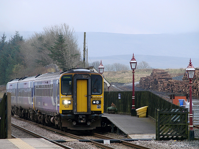 A Carlisle bound train stands at the 'down' platform at Ribblehead station