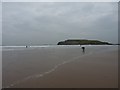 SS4092 : Surfers on the beach at Llangennith by Richard Law