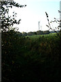 TM5285 : Wind turbines through hedge, Kessingland by John Goldsmith