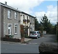 Three houses aligned at right angles to St Cenydd Road, Trecenydd, Caerphilly