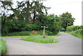 Footpath signpost near Putmans